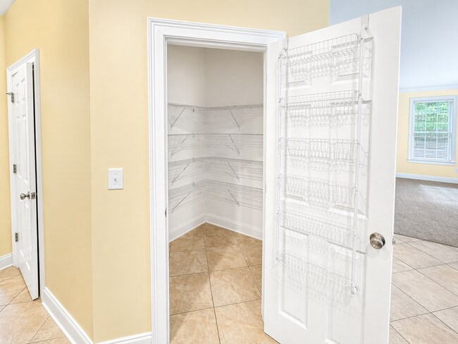 Building Photo - Clean 5 Bedroom Collins Hill Home with First Floor Suite and Oversized Master