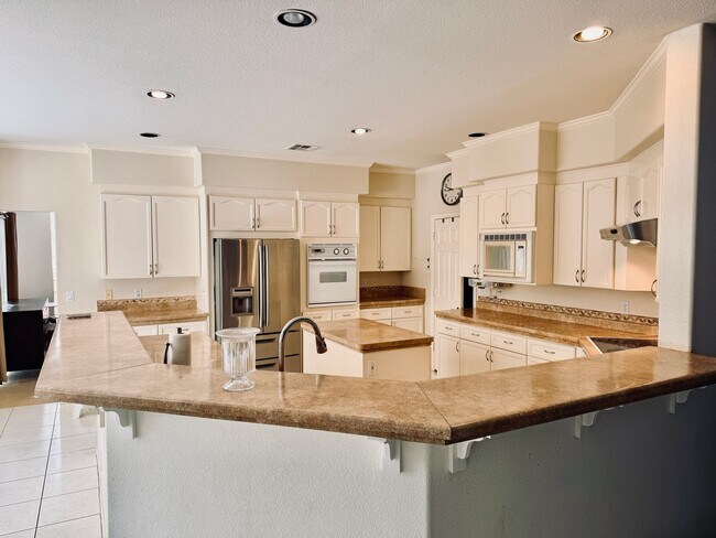 Building Photo - Partially furnished-Lovely 5 bedroom, 3 bath home in Legacy Master Series Community! $500 off fir...