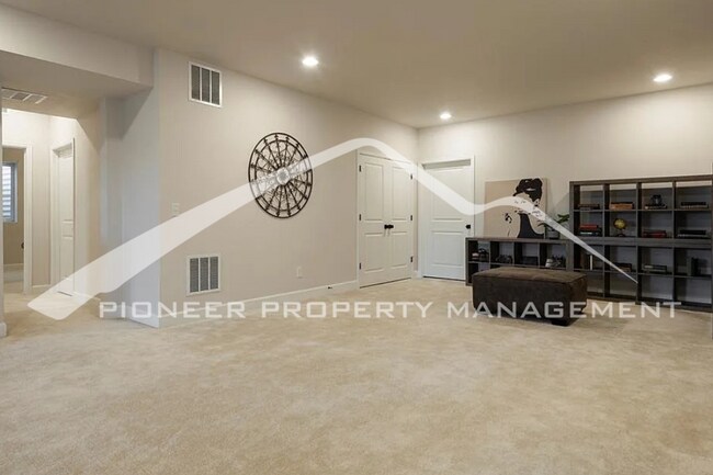 Building Photo - Stylish Main-Level Living with Finished Ba...