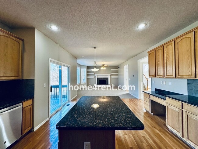 Building Photo - Gorgeous, Updated Home w/ Granite Counters and Wood Floors in Kitchen, Walkout Finished Basement!