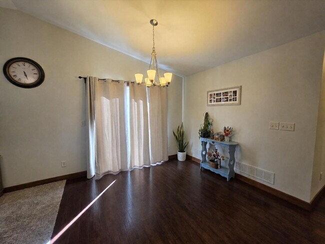 Building Photo - FREE SEPTEMBER RENT for this Spacious 4-Bedroom Home with Vaulted Ceilings with Finished Basement...