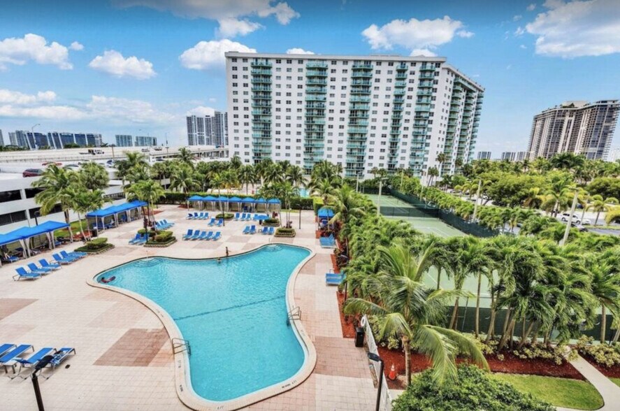 Building Photo - 19370 Collins Ave