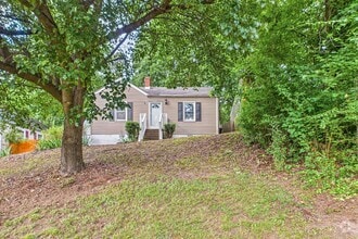 Building Photo - Adorable Home, Harwood Floors and Convenie...