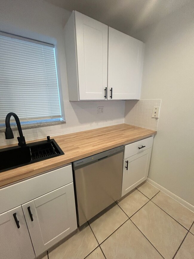 Building Photo - Now Leasing - Two bedroom condo with a pri...