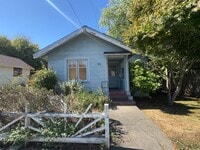 Building Photo - Sit out with your pet on the patio of this...