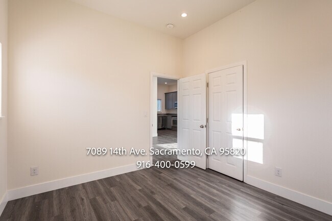 Building Photo - 7089 14th Ave