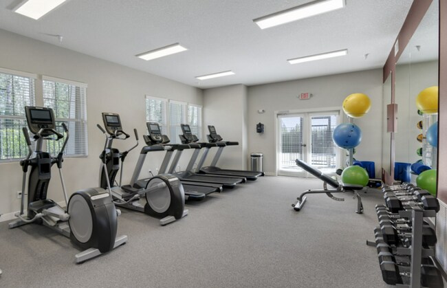 Building Photo - Modern Ground-Level Condo in River Terrace...