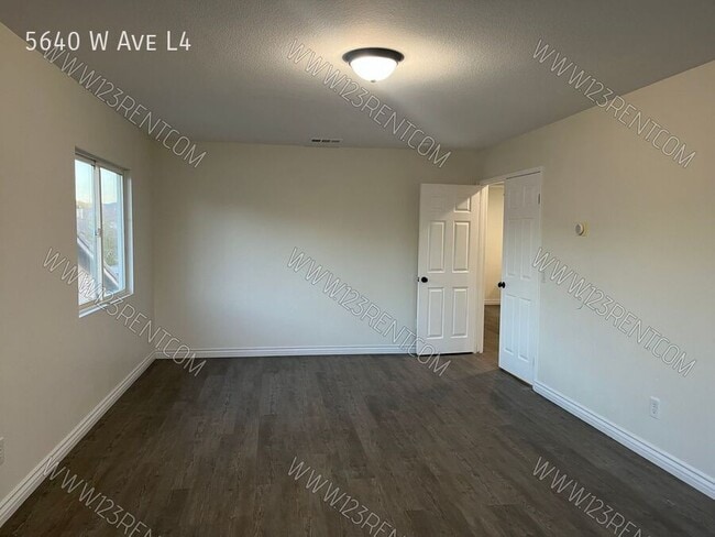 Building Photo - 5640 W Ave L4