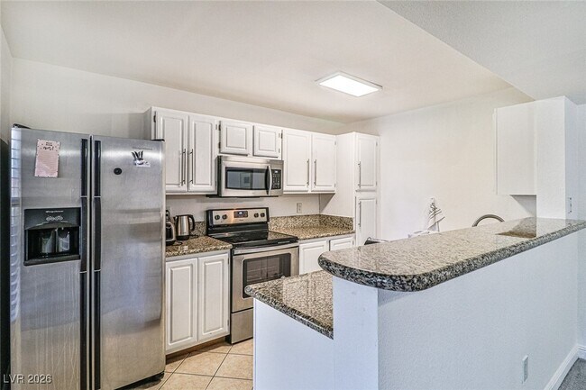 Building Photo - 5055 W Hacienda Ave