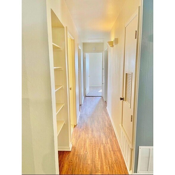 Hallway to bedrooms and extra storage space - 2915 Eagle Rdg