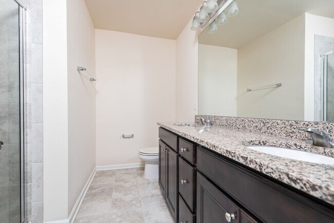 Building Photo - End unit townhome loaded with upgrades close to RTP! Available: Now