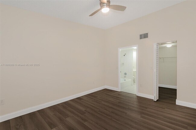 Building Photo - 3211 Sabal Palm Manor
