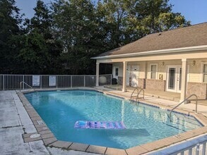 Building Photo - Townhouse with Pool Access. Assigned parking!