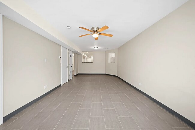 Building Photo - Spacious 2BR, 2BA Haven with Hardwood Elegance right across from Humboldt Park!