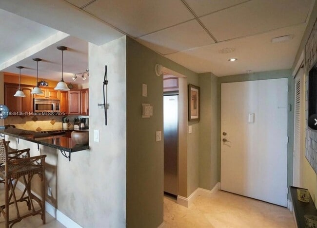 Building Photo - 19370 Collins Ave