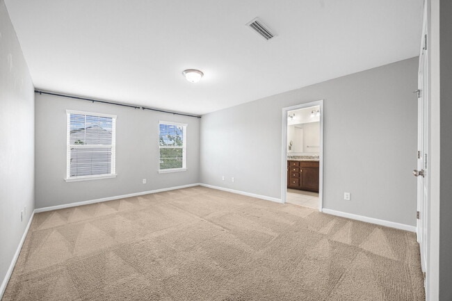 Building Photo - "Spacious 3-Bedroom Townhome with Fireplace, Pergola & Community Pool on Summerlake Drive!"