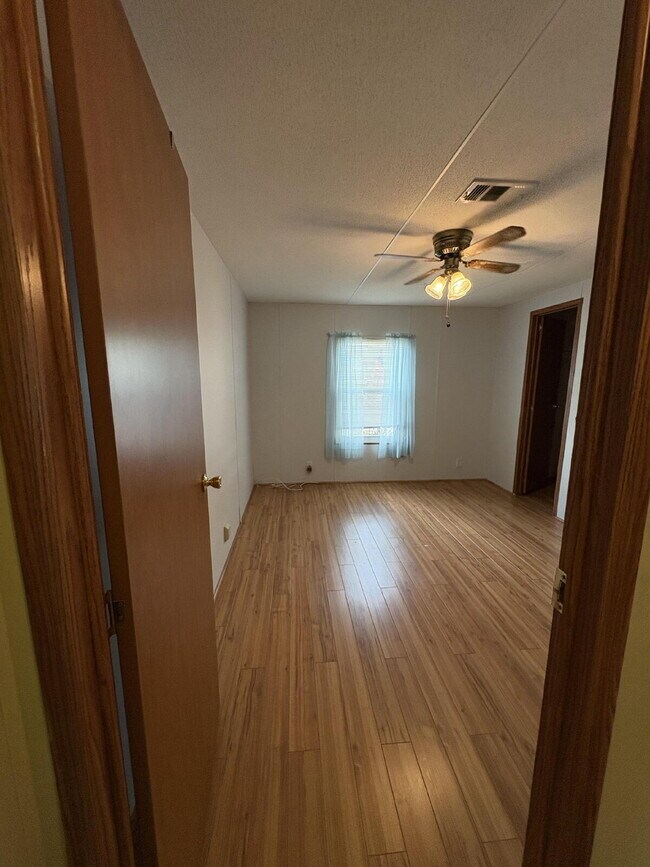 Building Photo - charming 3-bed, 2-bath home is located in the highly desired Strawberry Crest 55+ community