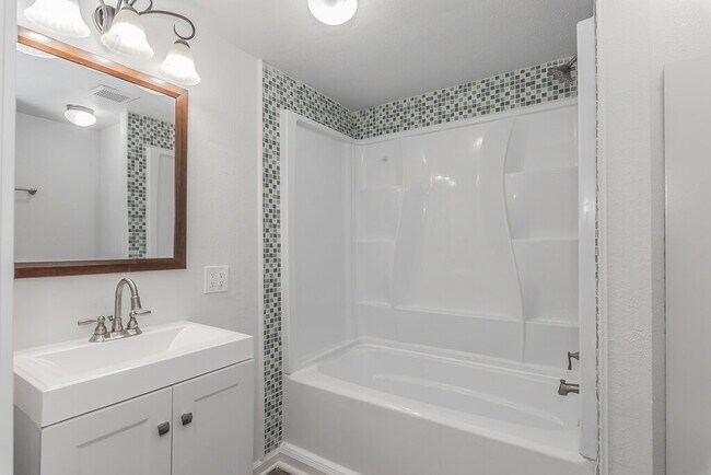 Building Photo - Welcome to modern living in with the charm of the past with this all electric 3 bedroom, 2 bath h...