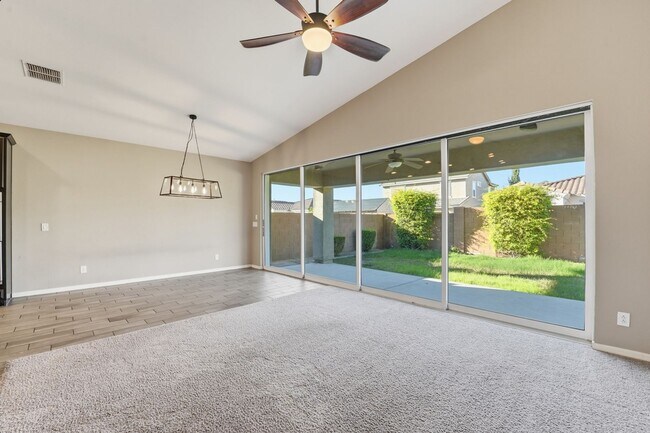 Building Photo - Stunning 4-Bed + Den Eastmark Home with Modern Upgrades Throughout