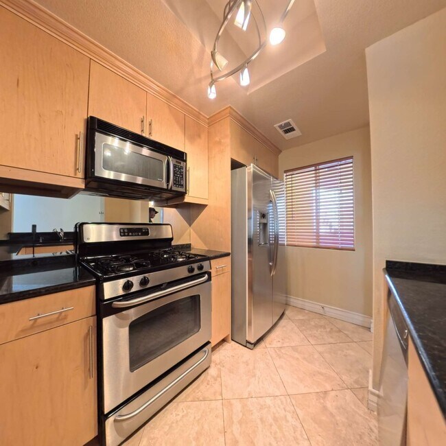 Building Photo - Luxury Mid-Rise | Guard Gated | Underground Garage Area | Resort Style Amenities