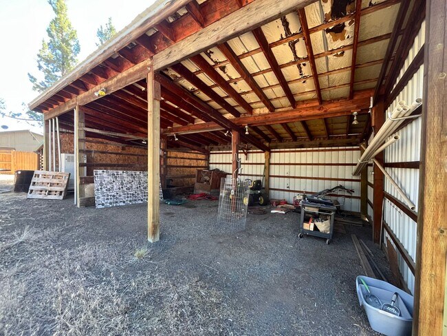 Building Photo - Custom Rustic 4-Bdr on beautiful 5 acres with Greenhouse in Sisters!