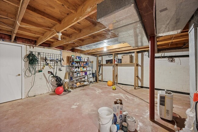 Building Photo - Available Immediately – 4 Bedroom End-Unit...