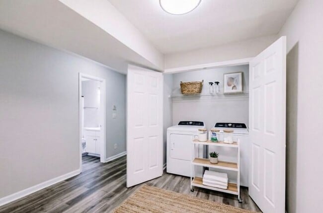 Building Photo - Spacious 2-Bedroom Elite Apartment with Private Balconies & Washer/Dryer