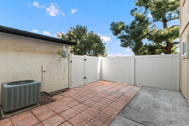 Building Photo - Premium Gated Townhome in Bonita Willows — A Perfect Blend of Comfort & Lifestyle