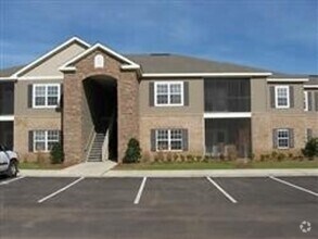 Building Photo - COMING SOON - FIRST FLOOR APARTMENT COMMUN...