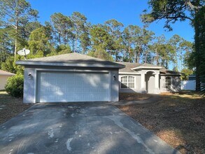 Building Photo - Spacious 3/2 in Quiet Neighborhood!