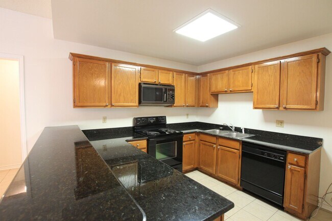 Building Photo - Available - Charming 2-bedroom, 2.5-bath townhome