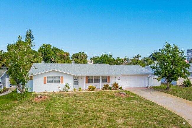 Building Photo - Welcome to your Perfect Beachside Retreat!