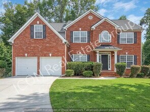 Building Photo - 4/2.5 home in a swim/tennis community