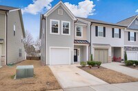 Building Photo - Stylish and Spacious 3 Bedroom, 2.5 Bathroom End-Unit Townhome w/ Garage!