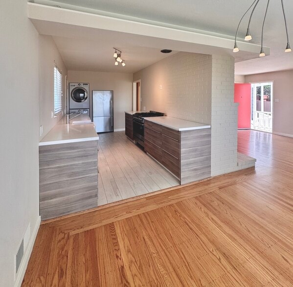 The bright, airy kitchen features Italian ceramic flooring, high end appliances and ample storage sp - 2403 Mira Vista Dr