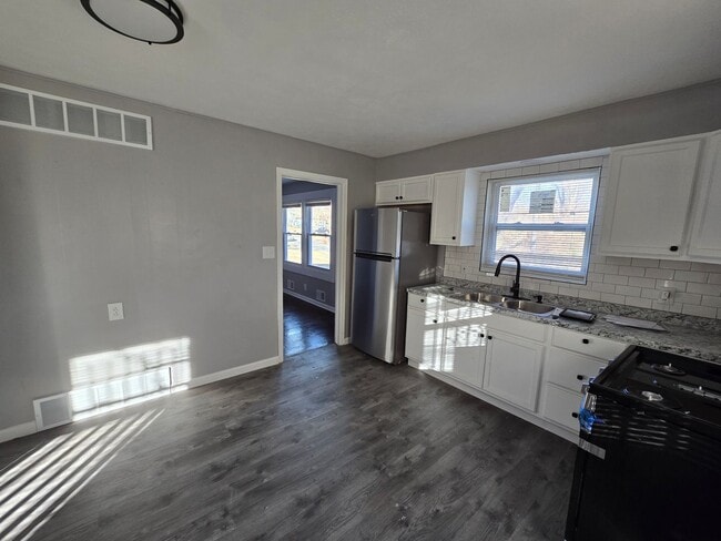 Building Photo - 3 bedroom with bonus extra room in basement fully rehabed