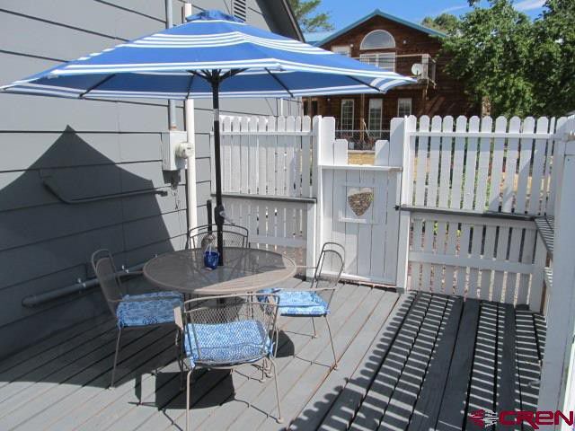 Back Patio, fully fenced. - 165 NW 2nd St