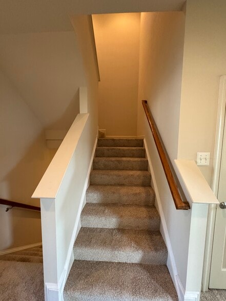 Here are the steps to the third floor loft... note the new premium carpeting and padding! - 44520 Gray Wolf St