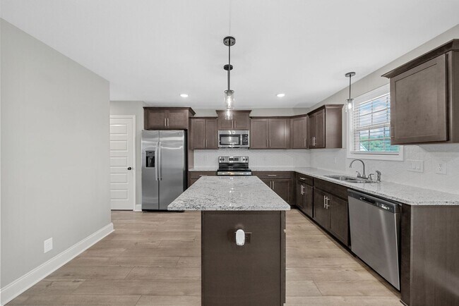 Building Photo - Beautiful 4-Bedroom Home with Modern Comfo...