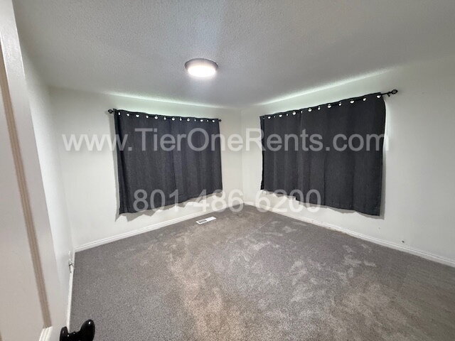 Building Photo - NO deposit option available for qualified ...