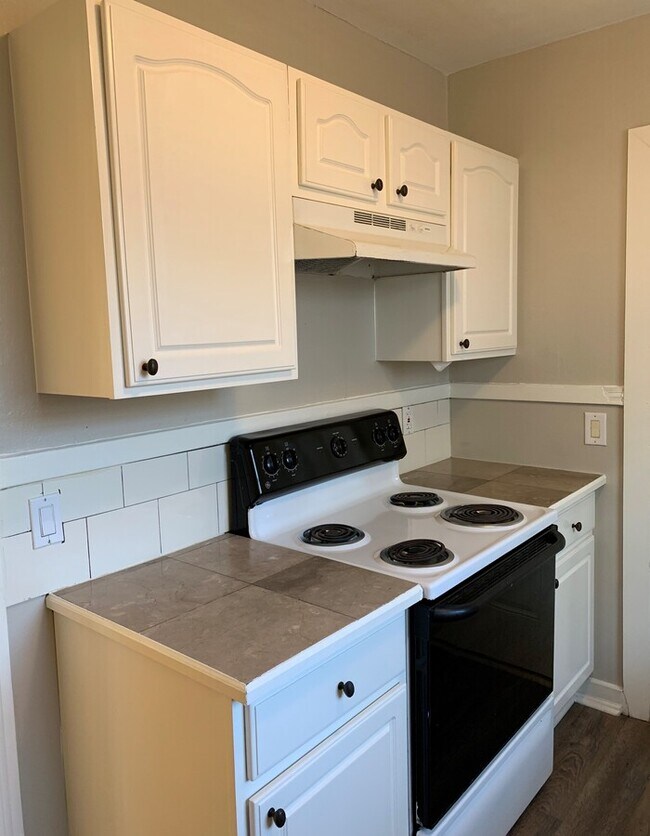 Building Photo - Charming Corner-Lot Home with Huge Fenced Yard & Detached Garage