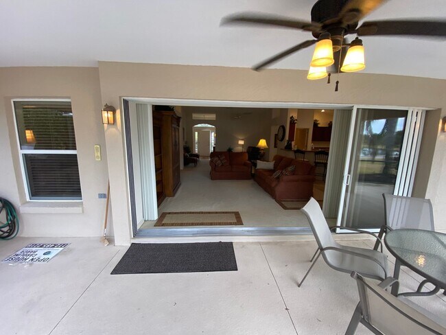 Building Photo - SEASONAL RENTAL. Large 4 Bed + 4 1/2 Baths Home, w/Views of the Jacaranda Golf Course and Lake in...