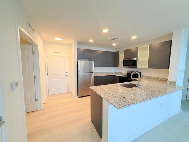 Building Photo - 5563 Millennia Park Dr