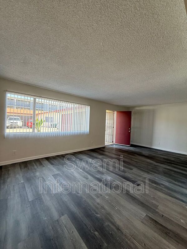 Building Photo - 13448 1/2-13612-22 Doty Ave
