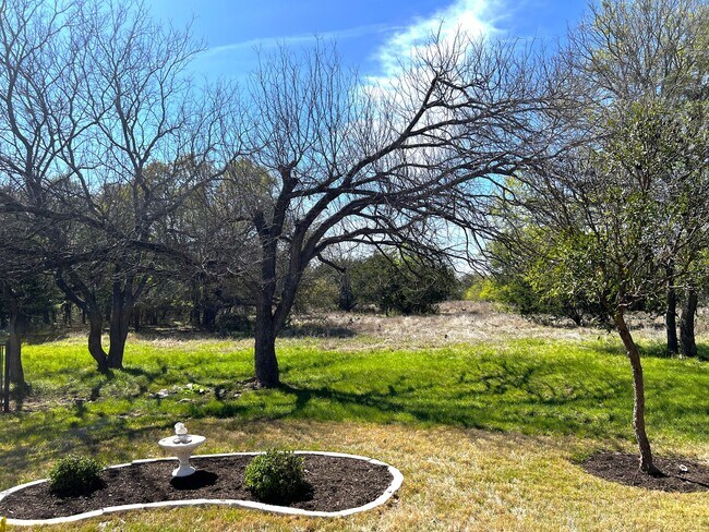 Building Photo - 809 Whispering Wind Dr