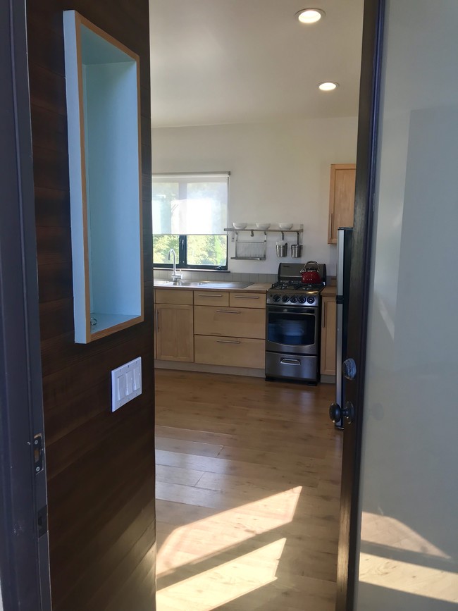 Kitchen with room for a desk to the left of the fridge - 1070 Amoroso Pl