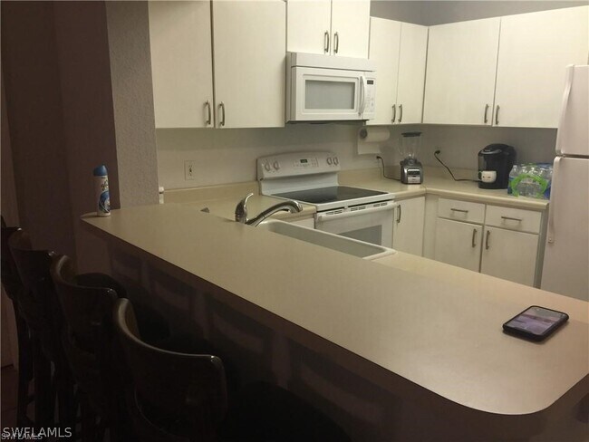 Building Photo - 8271 Key Royal Cir