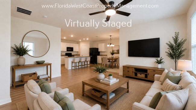 Building Photo - MOVE IN READY ! 4 BEDROOM/2 BATH! TILE- LVP THROUGHOUT! LAWN MOWING INCLUDED!