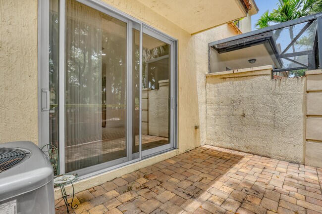Building Photo - 8332 Cocoplum Sound Ln
