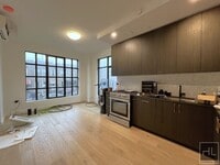 Building Photo - Luxurious 2 bedroom/2 Bathroom duplex apt ...